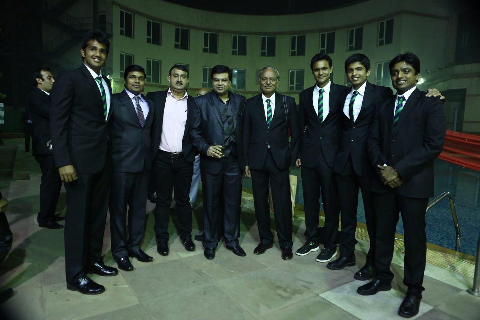 Ashwin with his Davis Cup team-mates and officials in team blazers and ties at a tie reception.